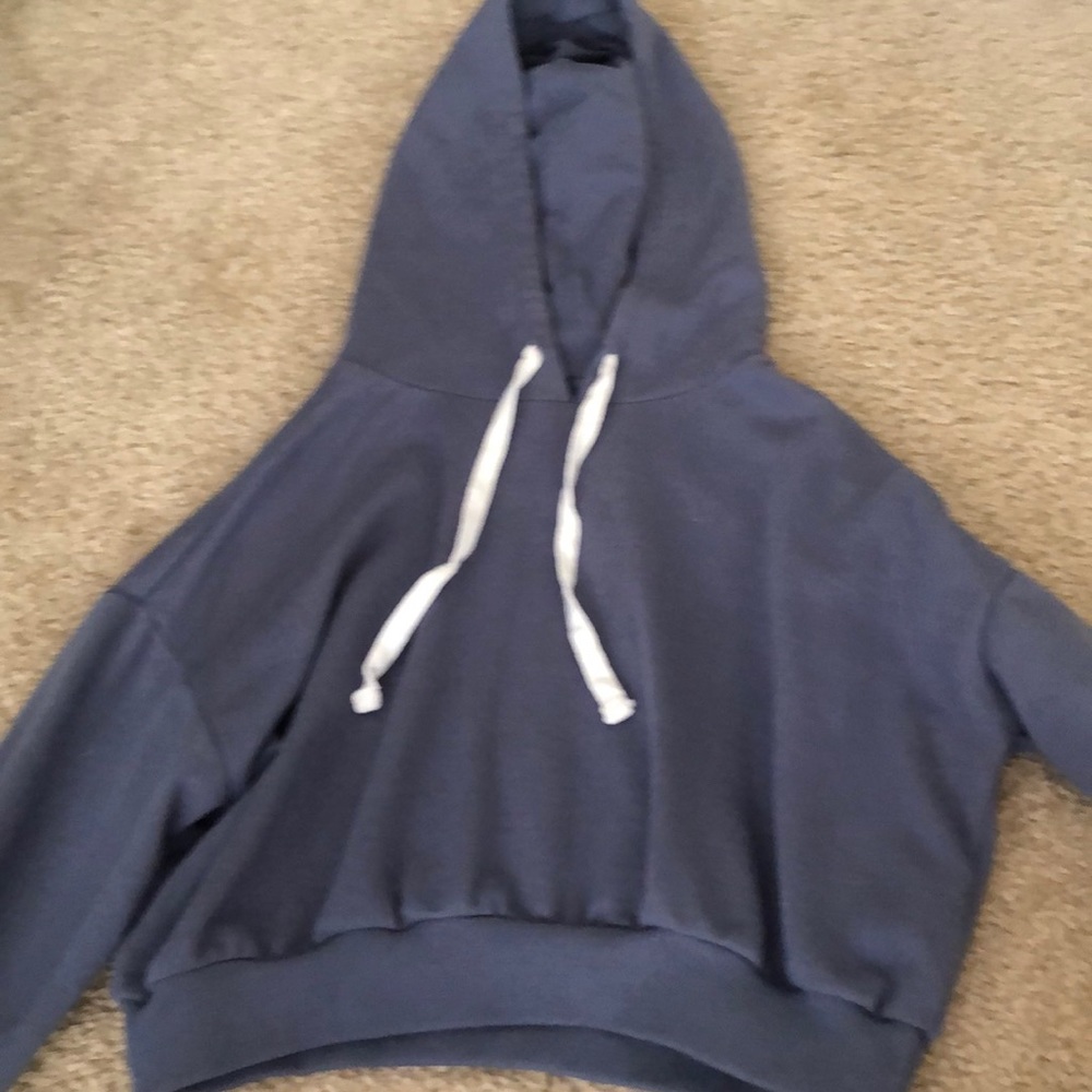 a long sleeve hooded crop top